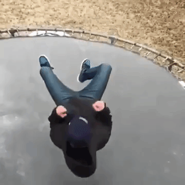 jumping-on-his-ice-covered-trampoline-in-slow-motion.gif